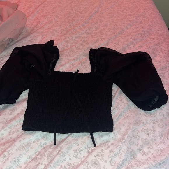 Black crop top. Very soft and had bubble sleeves that are see throught. - Picture 5 of 7
